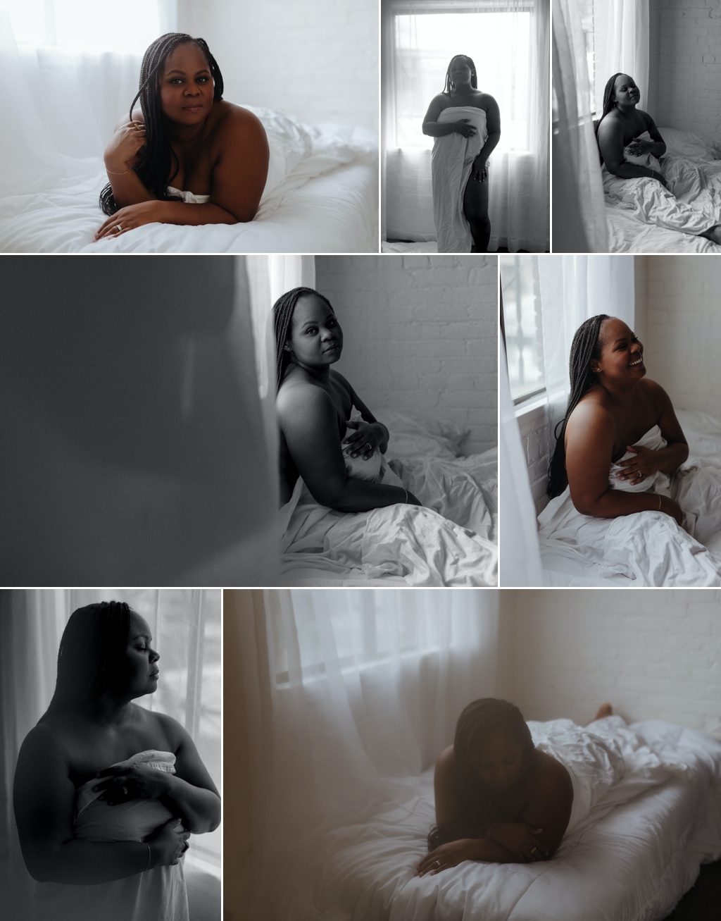 a curvy black woman with braids poses in front of a naturally lit window while wrapped in a white sheet, posing for boudoir photography photos